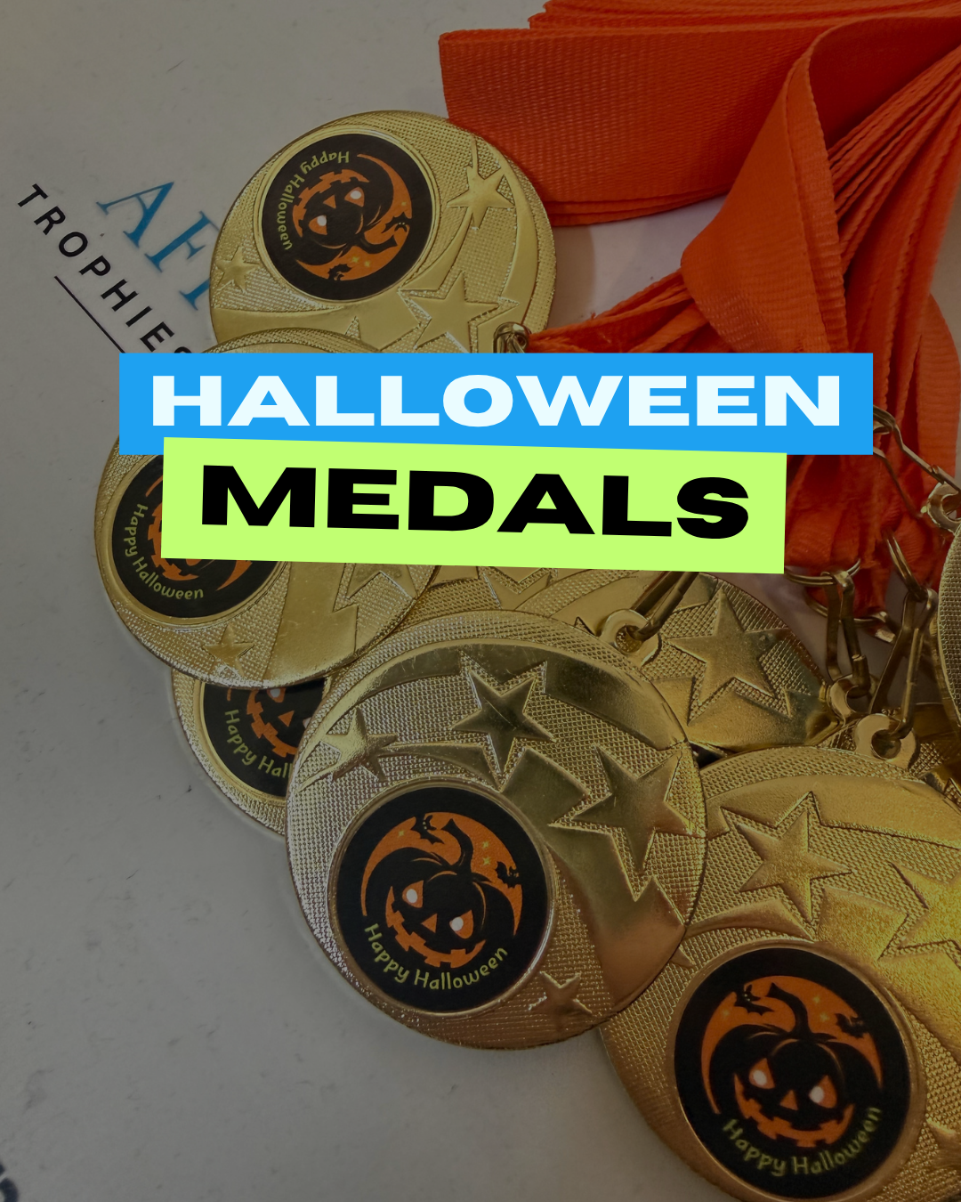 Halloween Medals promotional image showing gold medals with orange ribbons